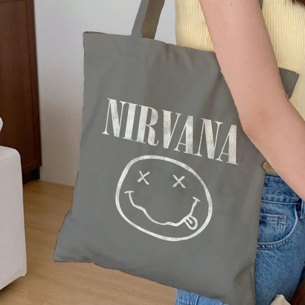 Tote bag coton bio Nirvana avec un design de Nirvana Smiley blanc