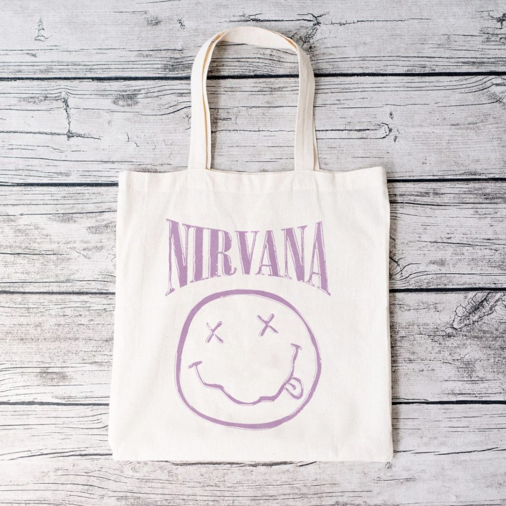 Tote bag coton bio Nirvana avec un design de Nirvana Smiley Artwork mauve
