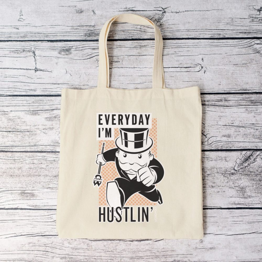 Tote bag coton bio Monopoly avec un design de Monopoly Everyday I'm Hustlin' blanc