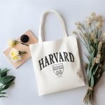 Tote bag coton bio Harvard avec un design de Harvard Arc Écusson Used Contour noir