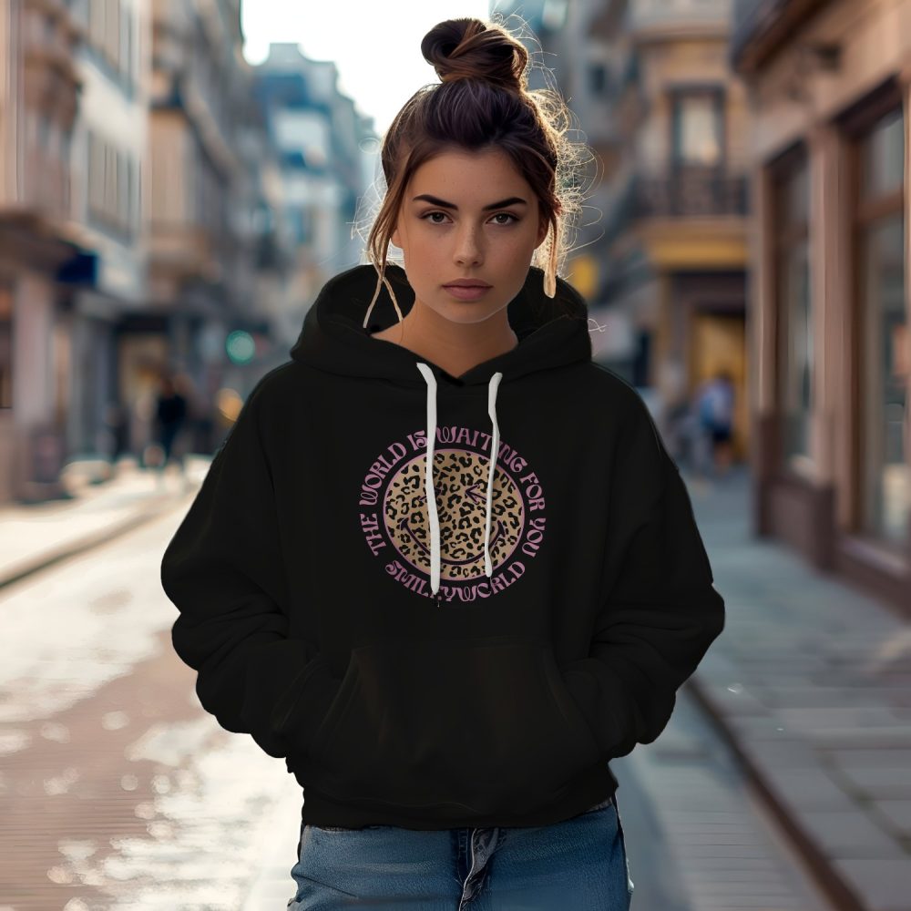 Sweat-shirt à capuche Femme Smiley World avec un design de Smiley World "The World Is Waiting For You"