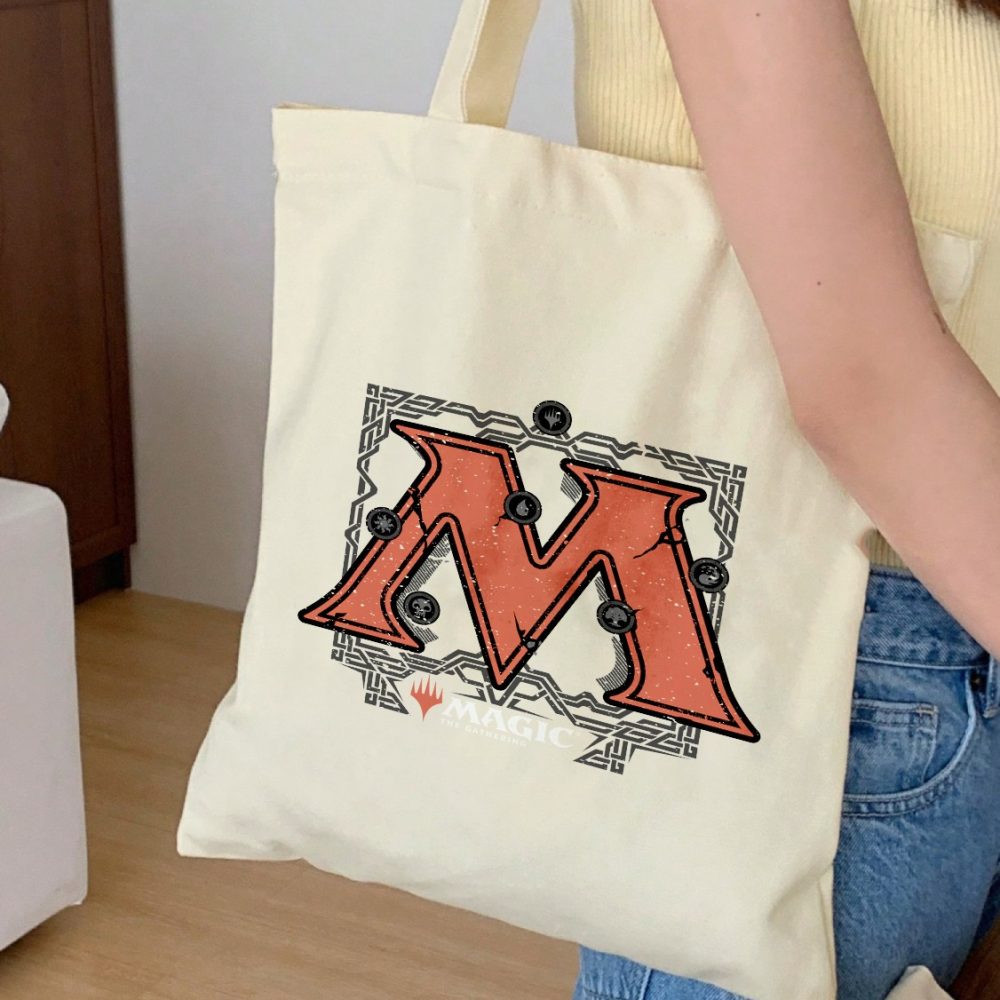 Tote bag coton bio Magic The Gathering avec un design de MTG The M